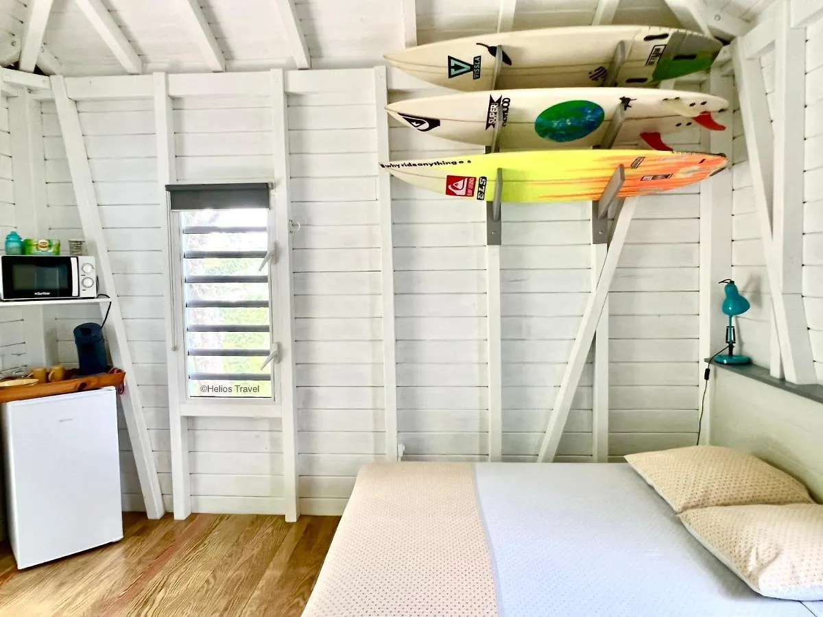Maison d'hôtes Le Surf Lodge, chambre avec vue mer dans un écrin de verdure Deshaies